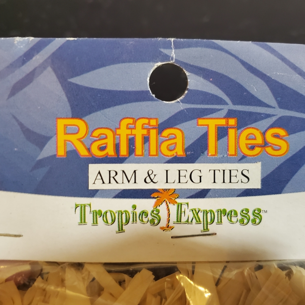 Raffia arm and leg ties.